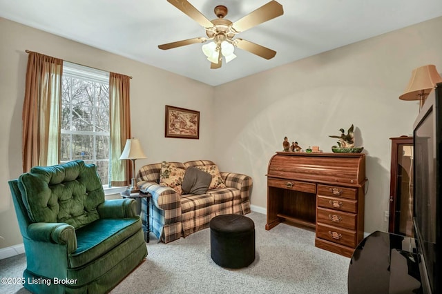 interior space with ceiling fan