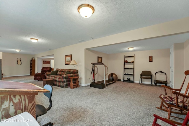 living room with carpet flooring and a textured ceiling