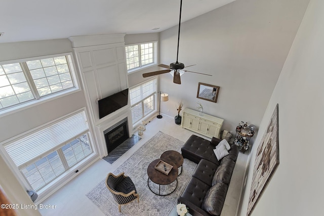 living room featuring a towering ceiling