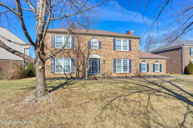 colonial house with a front yard