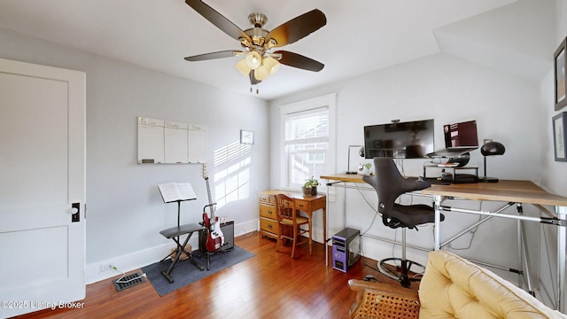 office space featuring ceiling fan and dark hardwood / wood-style floors