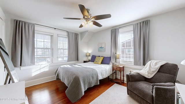 bedroom featuring dark hardwood / wood-style floors and ceiling fan