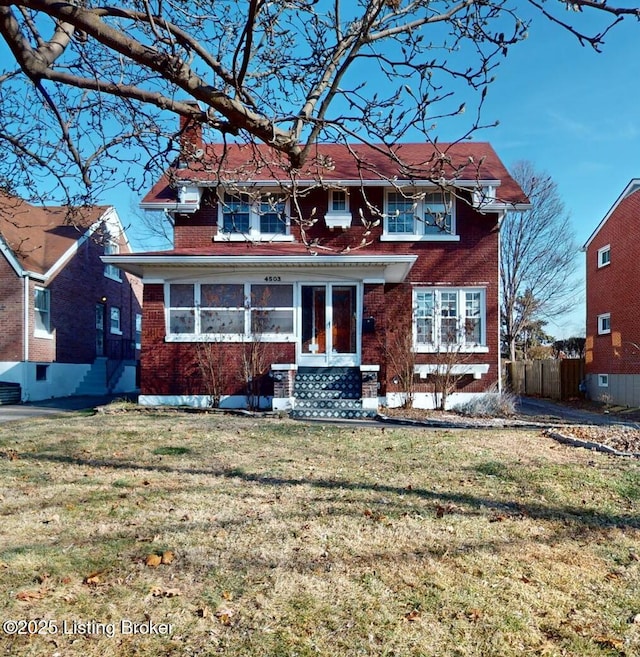 view of front of home with a front lawn