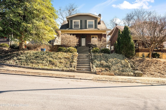 view of front of property featuring covered porch