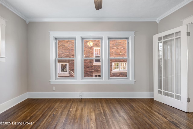 unfurnished room with crown molding and dark hardwood / wood-style floors