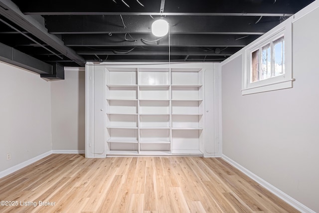 basement with light wood-type flooring