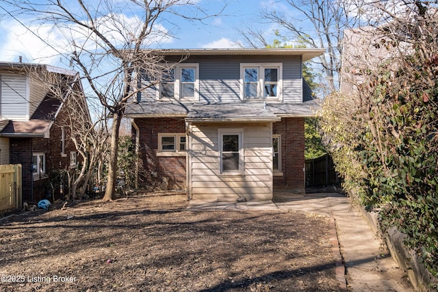 back of property featuring a patio area