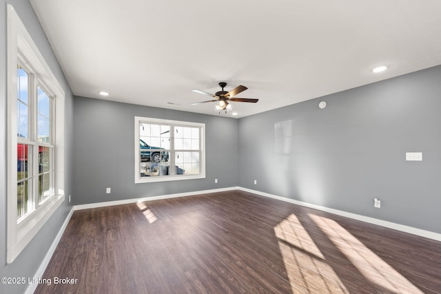 spare room featuring ceiling fan and wood-type flooring