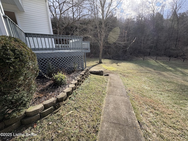 view of yard with a wooden deck