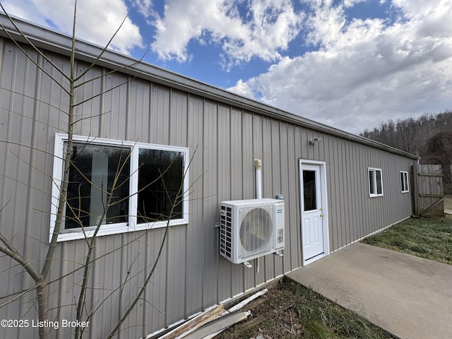 view of property exterior featuring ac unit