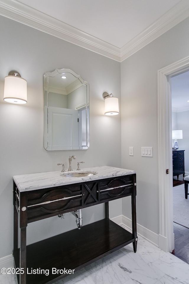 bathroom with vanity and ornamental molding