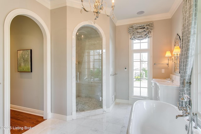 bathroom with ornamental molding, shower with separate bathtub, and vanity