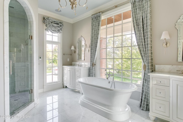 bathroom featuring vanity, crown molding, and independent shower and bath