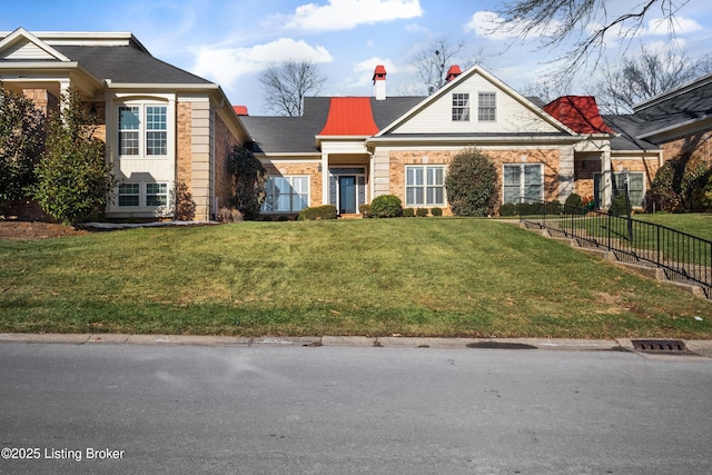 view of front facade with a front yard