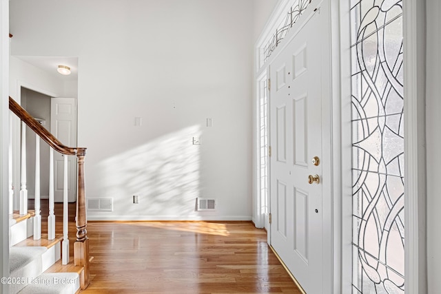 entrance foyer featuring hardwood / wood-style flooring