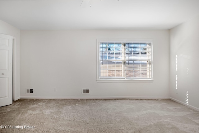 view of carpeted spare room