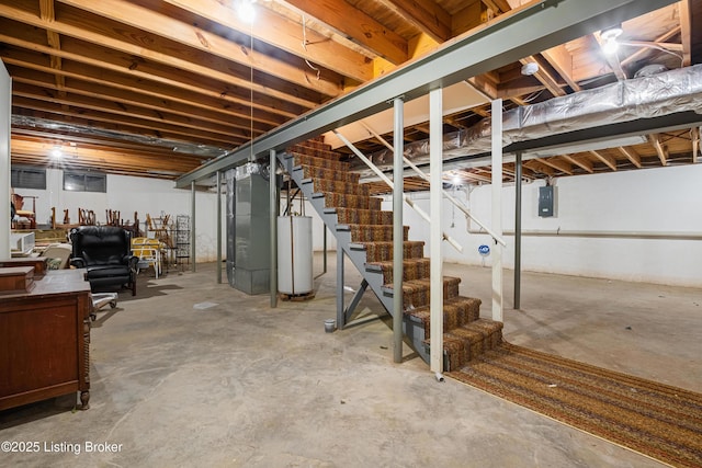 basement with gas water heater and electric panel