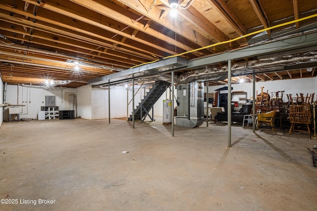 basement with heating unit and water heater