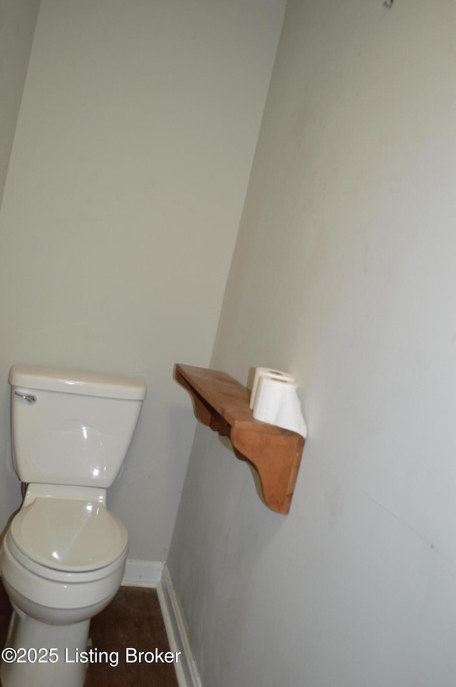 bathroom featuring toilet