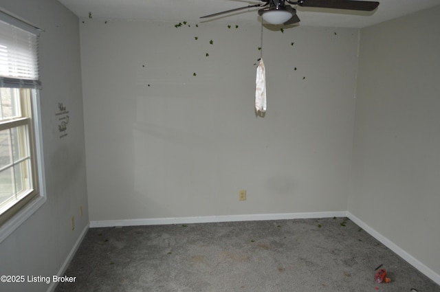 carpeted empty room with ceiling fan