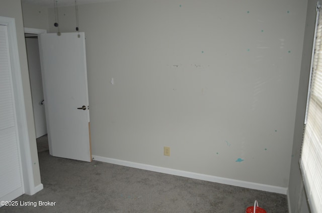 unfurnished bedroom with carpet