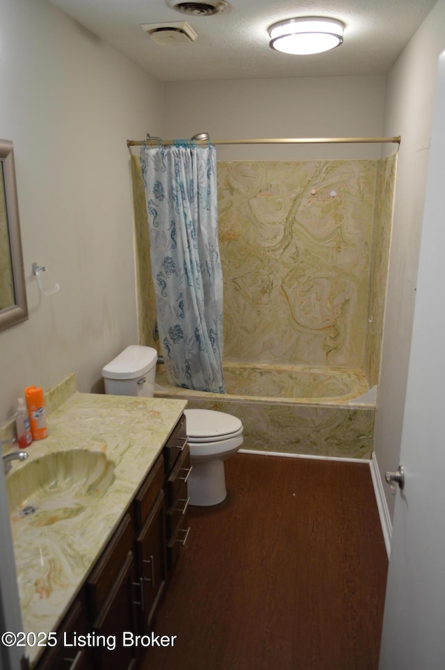 full bathroom with shower / bath combination with curtain, vanity, toilet, and hardwood / wood-style floors