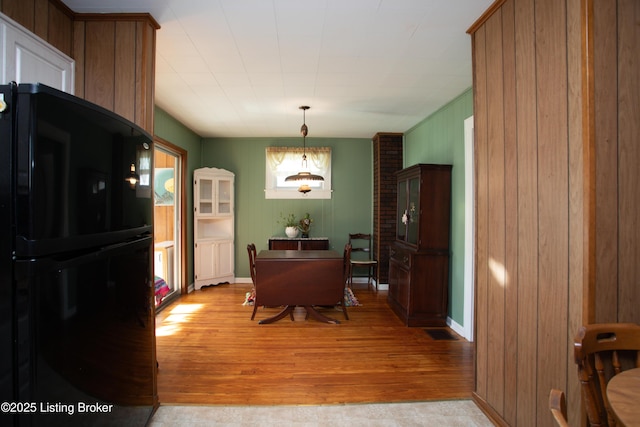 dining room featuring light wood-type flooring