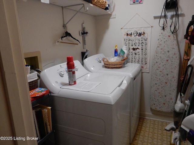 washroom featuring washing machine and dryer