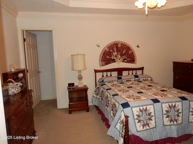 bedroom featuring crown molding and carpet flooring