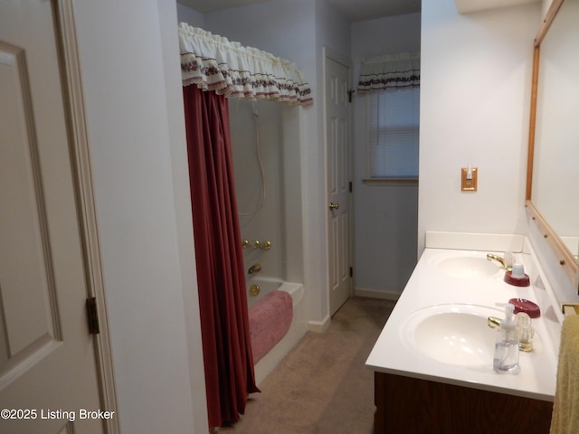 bathroom featuring vanity and shower / tub combination