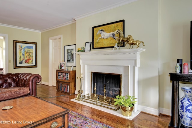 living room featuring ornamental molding and dark wood-type flooring