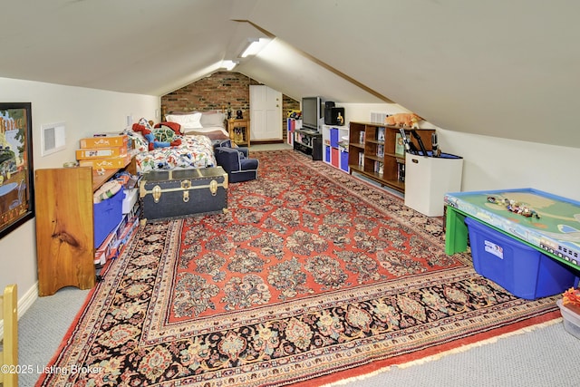 playroom with vaulted ceiling and carpet flooring