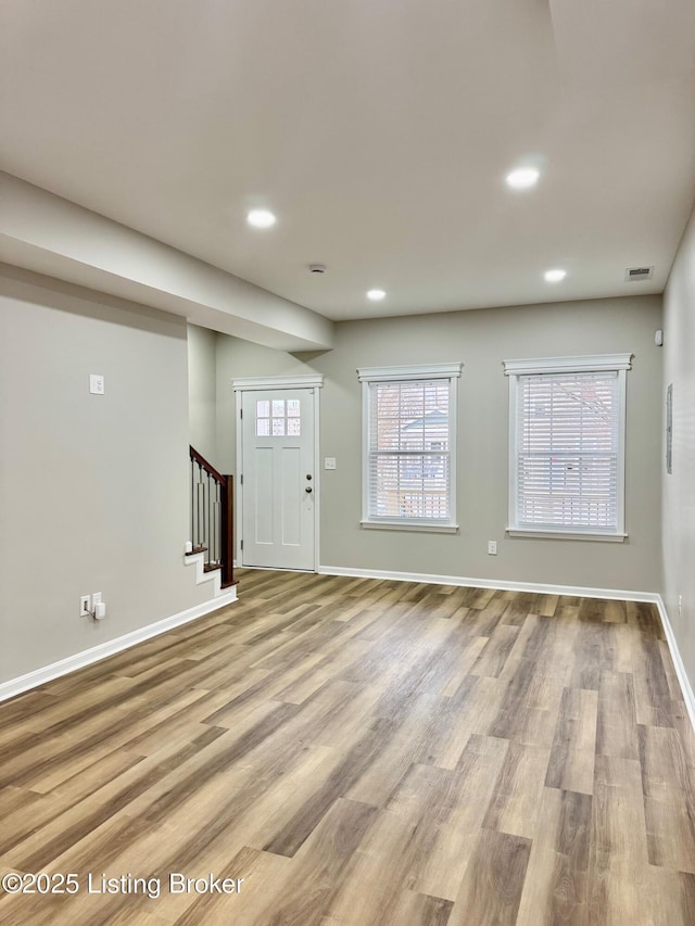 entryway with light hardwood / wood-style flooring