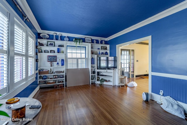 office featuring hardwood / wood-style floors and ornamental molding