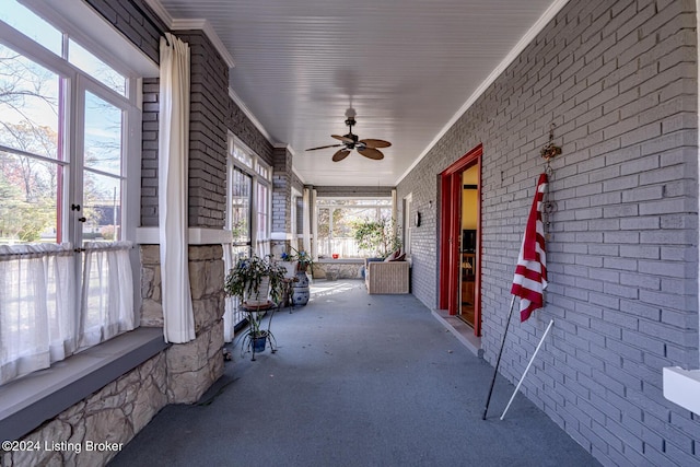 view of patio featuring ceiling fan and covered porch