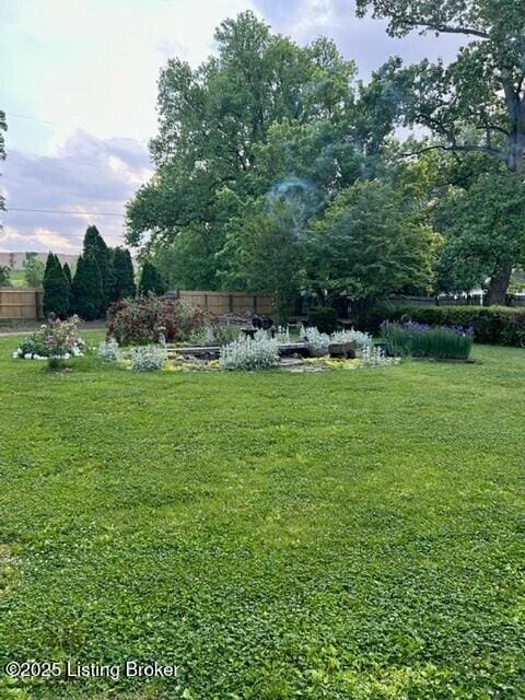 view of yard with fence