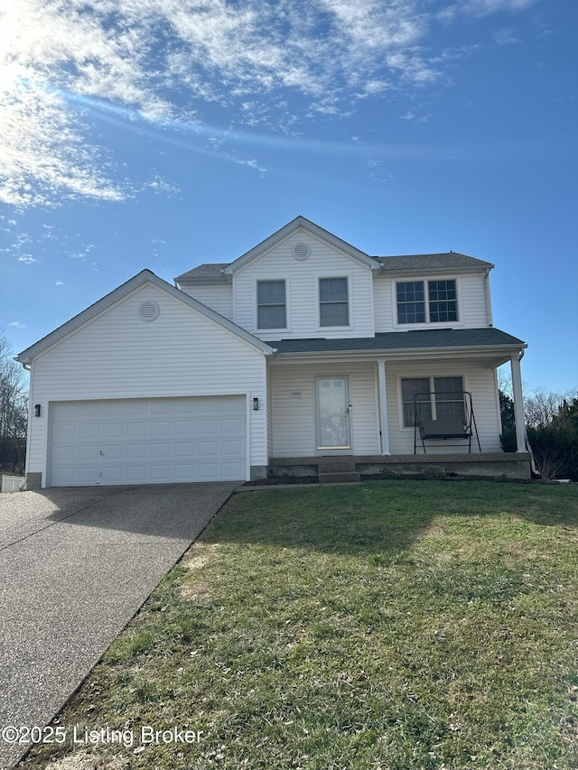 view of front property with a garage, covered porch, and a front lawn