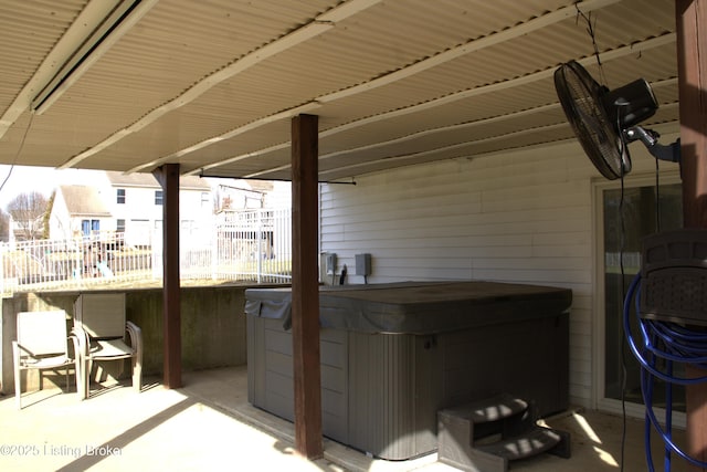 view of patio with a hot tub