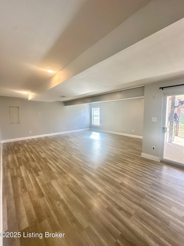 unfurnished room featuring hardwood / wood-style floors