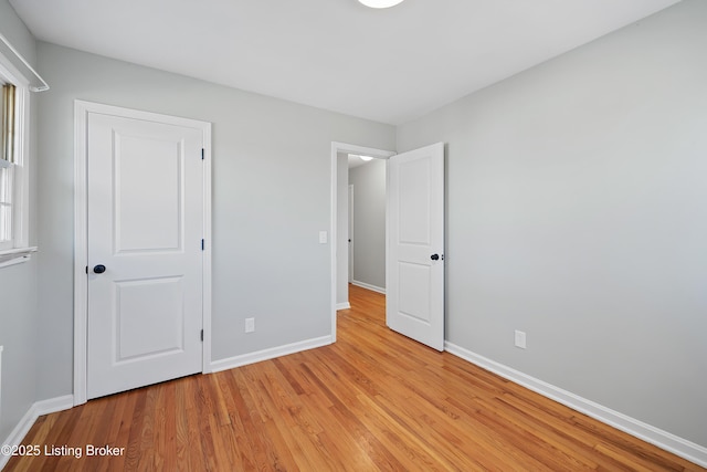 unfurnished bedroom with light hardwood / wood-style floors