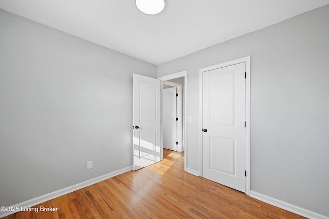 unfurnished bedroom with light hardwood / wood-style floors