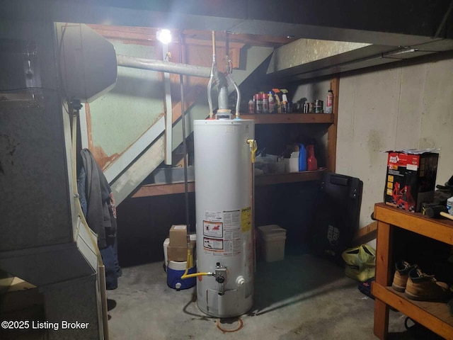 utility room featuring water heater