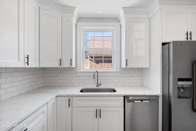 kitchen featuring white cabinetry, appliances with stainless steel finishes, and sink