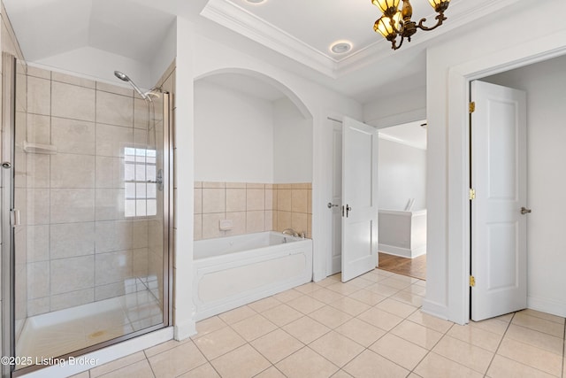 bathroom with ornamental molding, tile patterned floors, and plus walk in shower