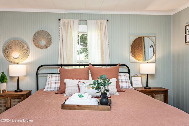 bedroom with crown molding