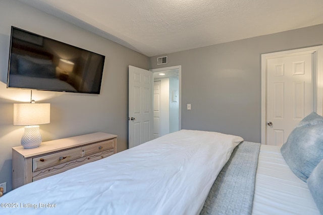 bedroom with a textured ceiling