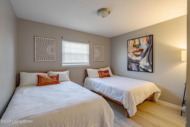 bedroom featuring hardwood / wood-style floors