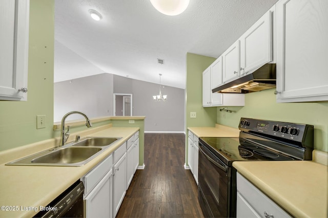 kitchen featuring sink, pendant lighting, white cabinets, and black appliances