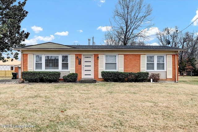 single story home featuring a front lawn