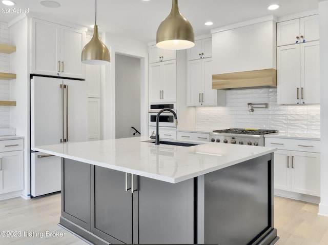 kitchen with light stone counters, white appliances, custom exhaust hood, and white cabinets